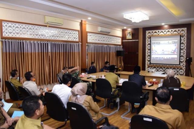 Video Konference, Plh Bupati Laporkan Perkembangan Penanganan Covid-19 Kabupaten Bengkalis 1