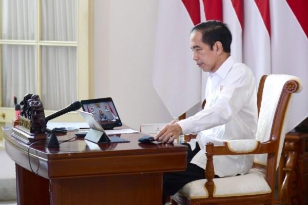 Jokowi Cabut Aturan Wajib Tes Antigen-PCR Bila Sudah Vaksinasi Lengkap 1